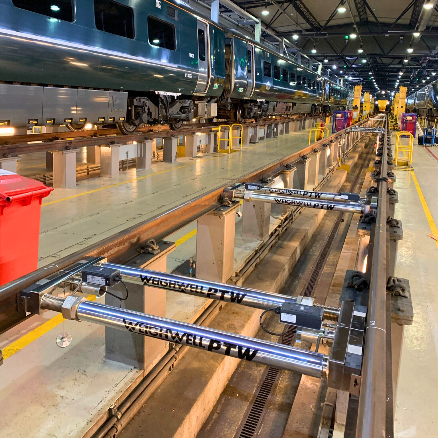 Portable Railcar Weighing System installed inside train maintenance depot Portable Railcar Weighing System installed inside train maintenance depot