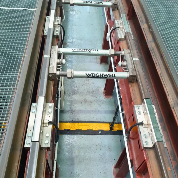 Portable train weighing system installed near a Trackcell System